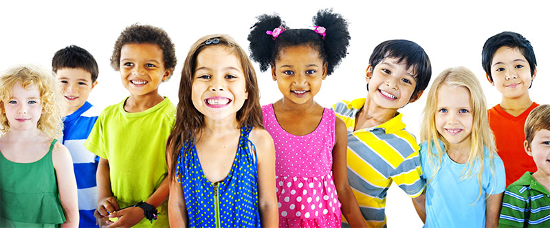 The image is a vibrant and colorful photograph of a diverse group of children and young adults, each with unique features and expressions, standing together in a joyful manner.